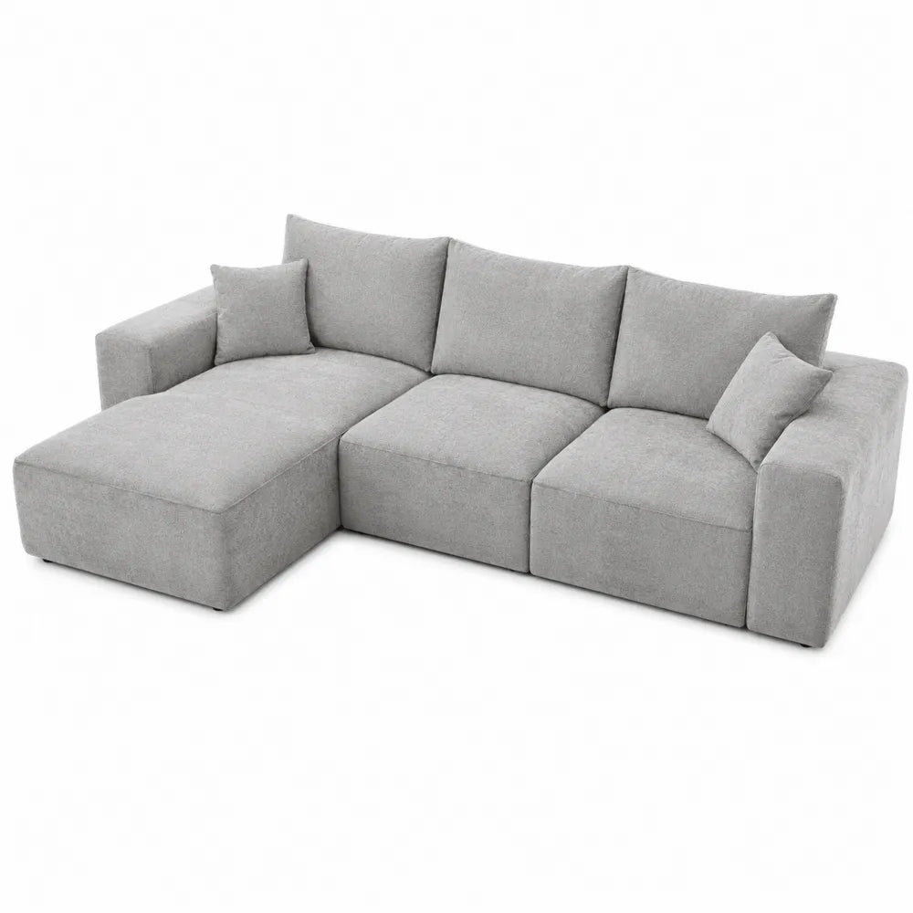 Divano angolare in tessuto grigio con chaise longue